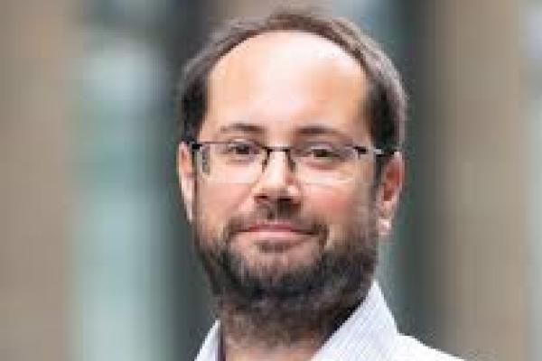 Portrait photo of Dr. Miklos Sebok