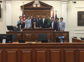 Dr. Kim and 2016 program participants inside courthouse