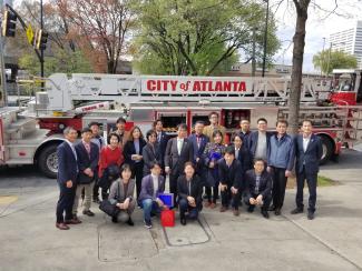 2019 IPPMI Cohort in front of fire truck in Atlanta