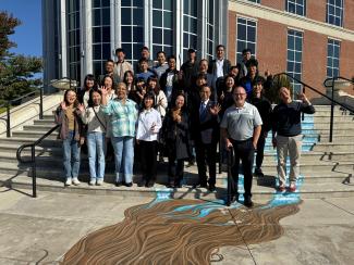 IPPMI cohort photographed together after a field visit with the Somerset City Government.