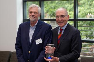 Bill Hoyt receiving research award