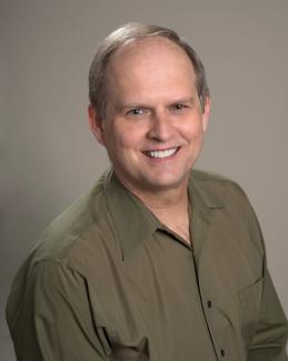 Headshot photo of Dr. Robin Hanson
