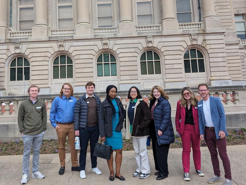 Group of students posing in front of Kentucky capitol building